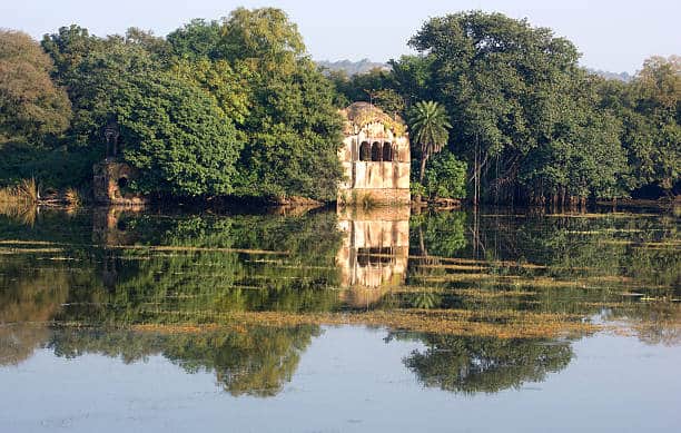 Lakeside pavilion reflected in a lake