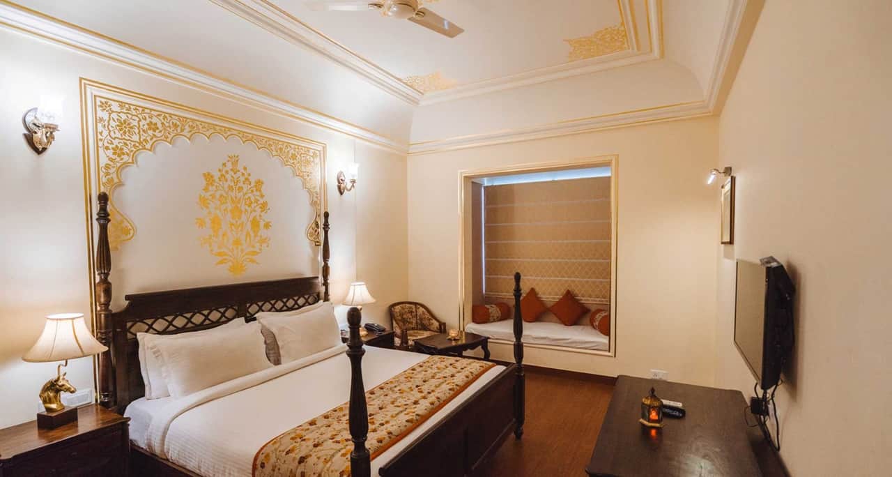 Guest room at WelcomHeritage Mount Valley Resort